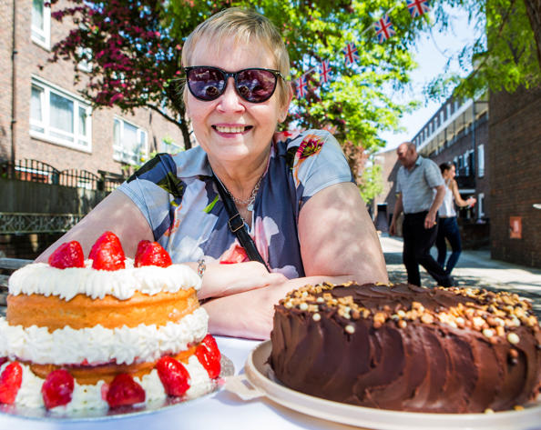 A lady and two cakes